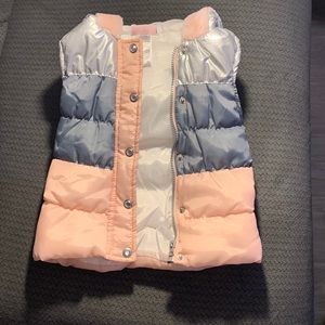 Kids light pink, grey, & silver hooded vest. It is a 4t.